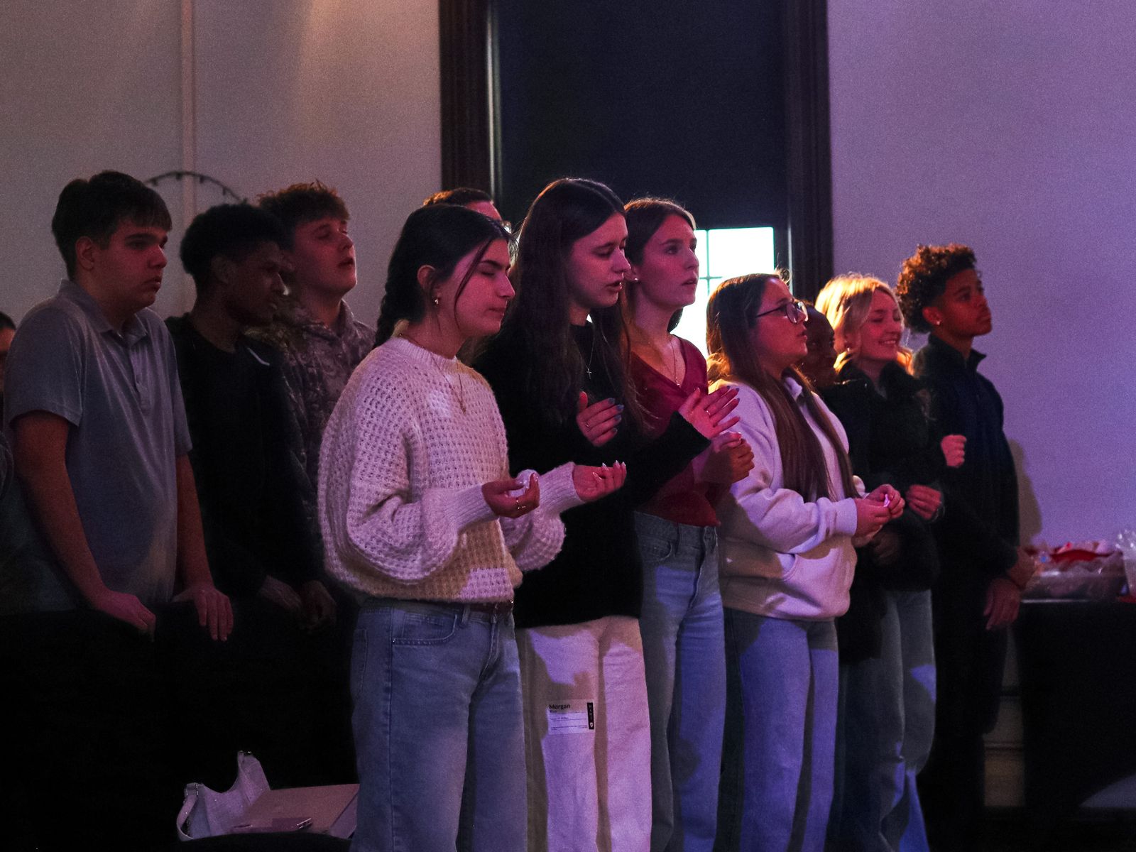 Students worshiping at youth night